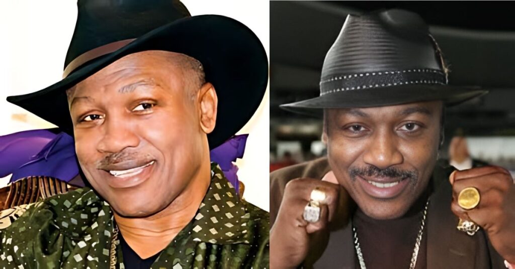 Joe Frazier is wearing black hat