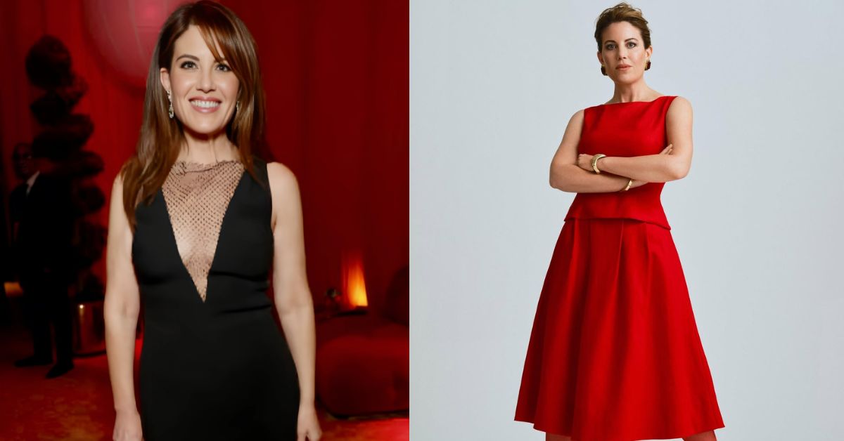 A person in a red dress poses for a photo