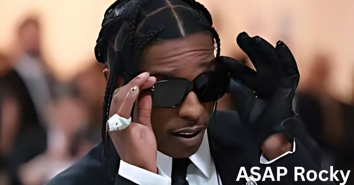 A person in a suit and tie is wearing sunglasses